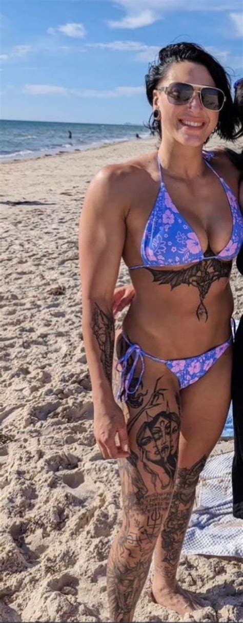 Rhea Ripley Showing Off Her Tattoos In A Bikini Cufo510