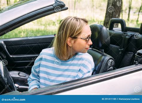 A Woman Is Driving A Convertible Car Summer Road Trip To Nature Stock Image Image Of Portrait