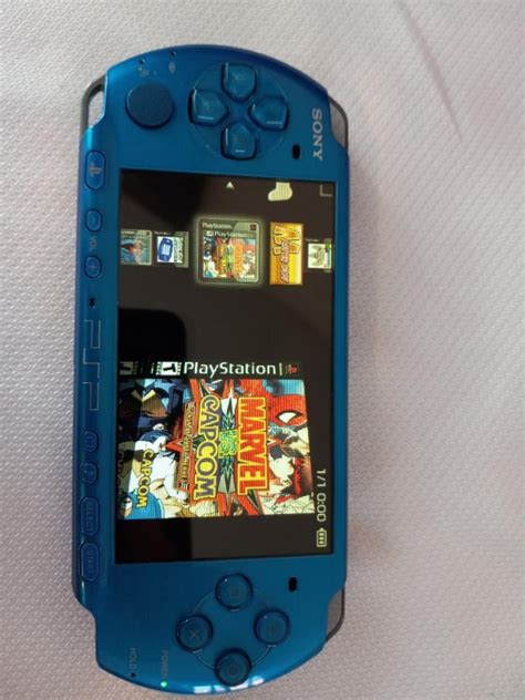 Like New Vibrant Blue Slim Psp With Games For Sale