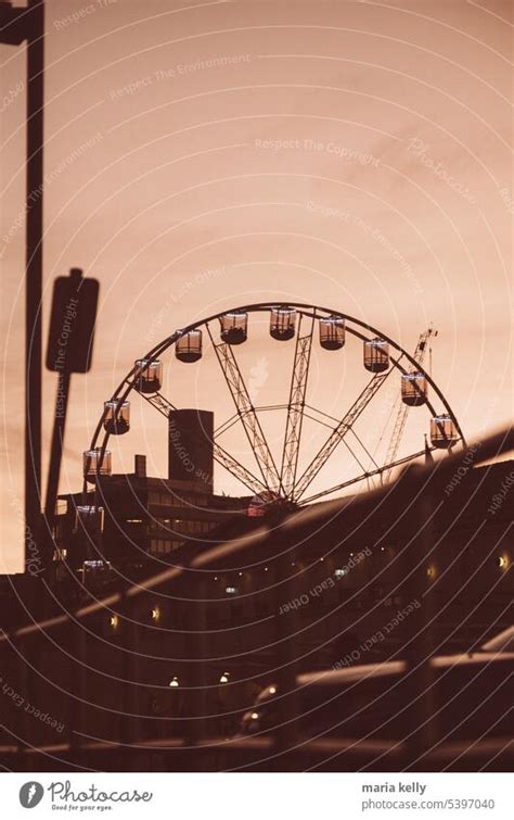 Ferries Wheel On Amusement Park During Sunset A Royalty Free Stock