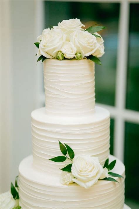 White Wedding Cake With Greenery