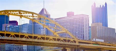 Fort Duquesne Bridge over downtown buildings view | ISDA Financial Life