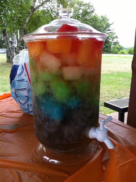 Kool aid Ice cubes of every color layered in a pitcher w sprite! Yummy ...