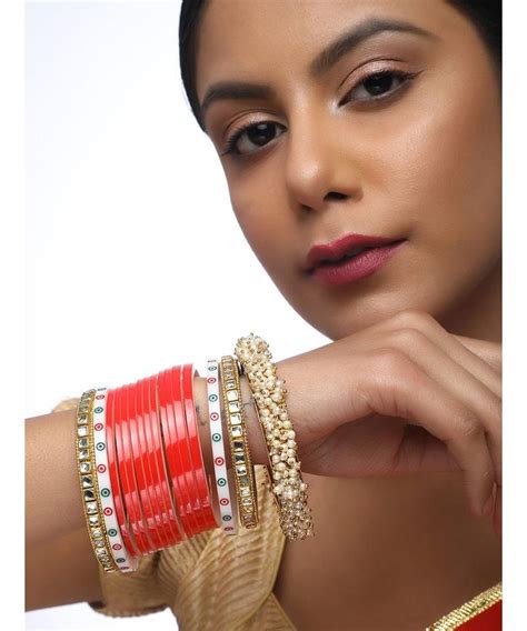 Red Chuda With Kundan Bangles And Heavy Pearl Bangles Ruby Raang Studio