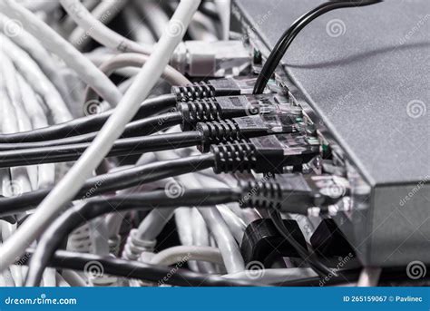 Detail Of Server Room With Bunch Ethernet Cables At The Back Of Stock