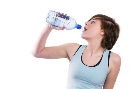 Premium Photo Pretty Brunette Drinking Water