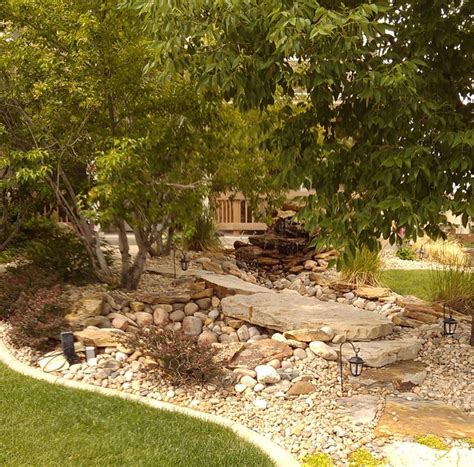 Front yard waterfall | Front yard, Outdoor, Outdoor decor