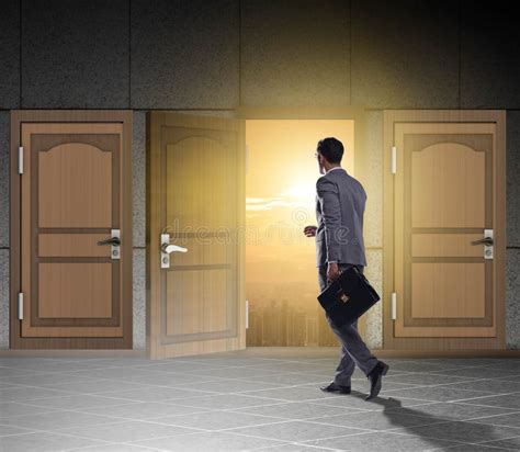 Businessman Walking Towards Open Door Stock Photo Image Of Leadership