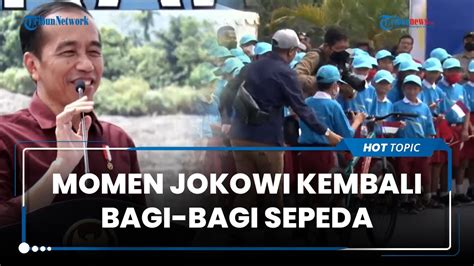 Momen Jokowi Kembali Bagi Bagi Sepeda Saat Meresmikan Bendungan Kuwil