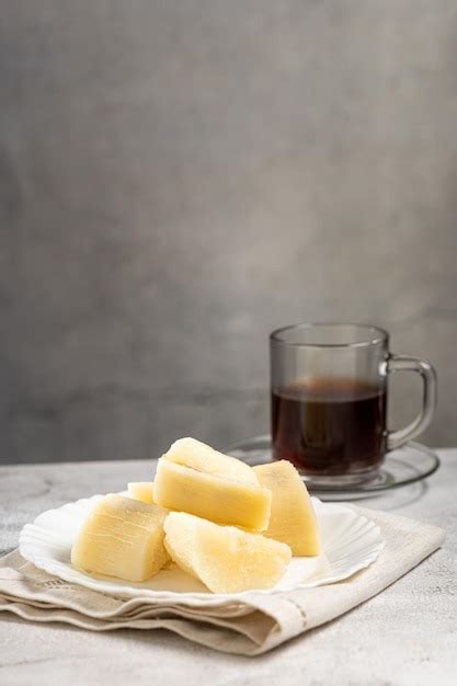 Premium Photo Cooked Cassava Served On Plate On The Table