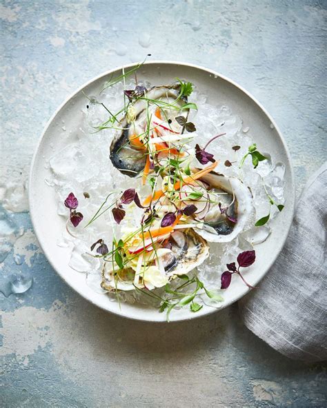 Oysters with dongchimi (radish kimchi) - delicious. magazine