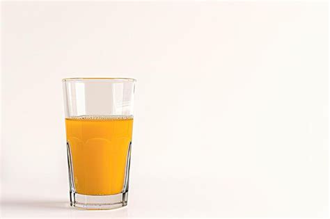 Glass Of Orange Juice Isolated On White Background Premium Ai Generated Image