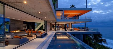 Premium Photo | Modern oceanfront house with dusk views