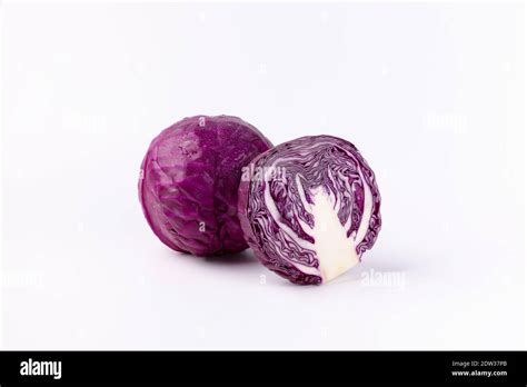 Two Halves Of Red Cabbage Isolated On A White Background Stock Photo