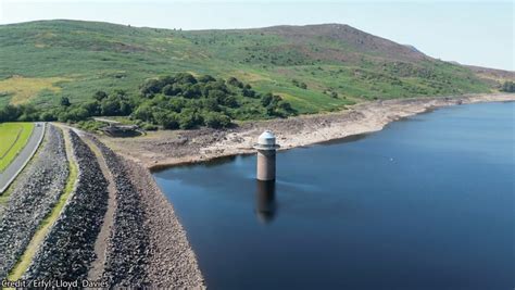 Water Levels At Notorious Reservoir Which Covers Flooded Welsh Village