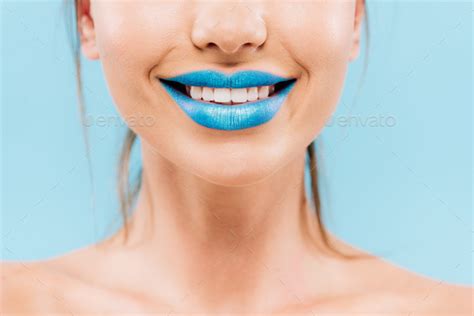 Cropped View Of Smiling Naked Beautiful Woman With Blue Lips Isolated On Blue Stock Photo By