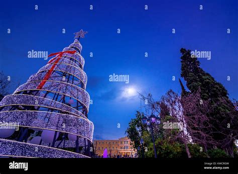 Lit Christmas Tree In Syntagma Square In Athens Greece With Parliament