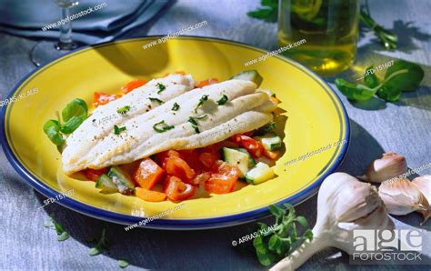 Rombo E Verdure Turbot Fillet On Bed Of Vegetables Italy Stock Photo