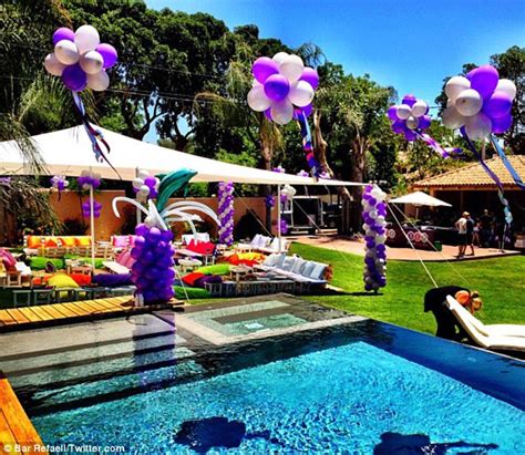 Bar Refaeli Posts Cute Bikini Shot On Twitter As She Catches Rays In Her Hand On The Beach