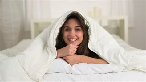 Cute Woman Under Covers Bed Stock Footage Video (100% Royalty-free ...