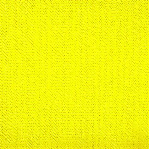 Premium Photo Seamless Yellow Fabric Texture For The Background