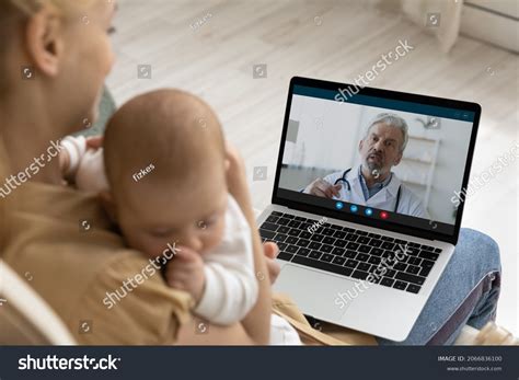 Doctor Talking To Parents Images Stock Photos Vectors