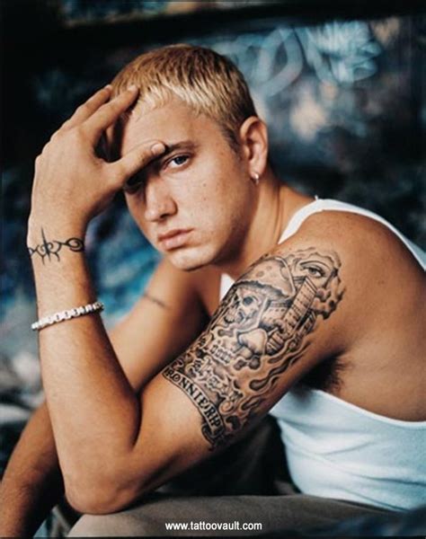 Eminem Wrist And Bicep Tattoo Eminem Tattoo Famous Tattoos Tattoos