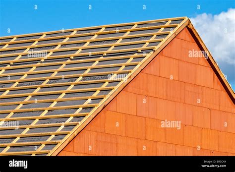 New bungalow pitched roof construction showing softwood pine timber ...