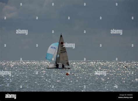 Racing in a Fireball dinghy in Carmarthen Bay Pembrokeshire Stock Photo ...