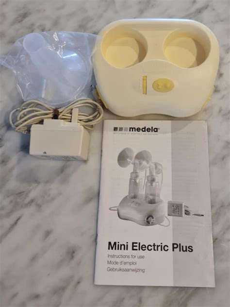 Medela Mini Electric Plus Breastpump With Unused Breast Shields Babies