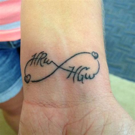 husband wife infinity tattoos | love infinity tattoo name designs great feather tattoo names ...