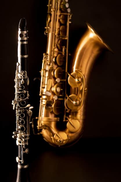 Classic Music Sax Tenor Saxophone And Clarinet In Black Premium Photo