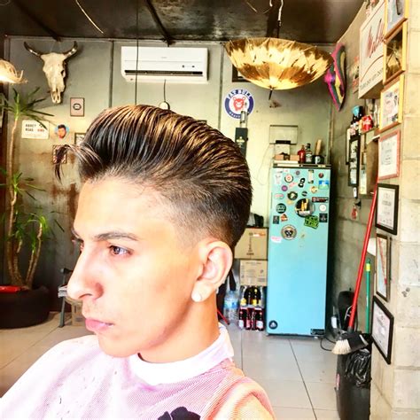 Barbers are debating the evolution of the classic corte fade look 13