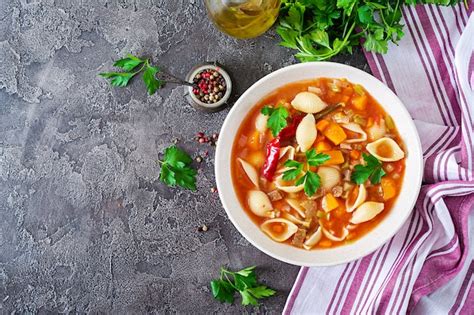 Premium Photo Minestrone Italian Vegetable Soup With Pasta On Table