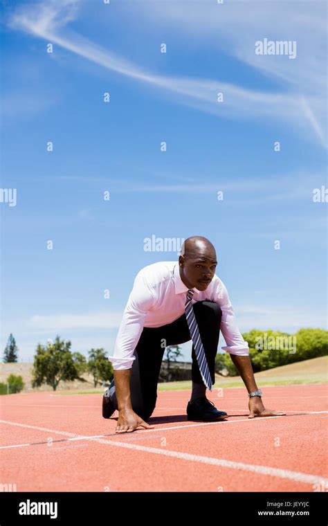 Businessman Ready To Run Stock Photo Alamy