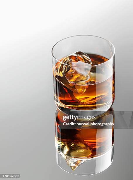 483 Whiskey Ice Cubes Stock Photos, High-Res Pictures, and Images - Getty Images