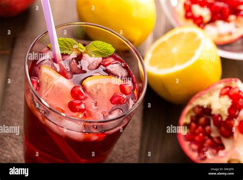 Pomegranate With Lemon And Ice Top View Stock Photo Alamy