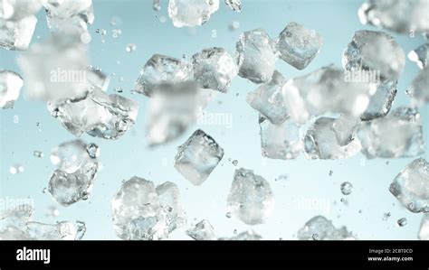 Crushed ice explosion on blue background. Freeze motion of flying pieces of ice Stock Photo - Alamy