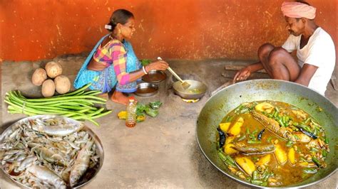 Mixed Small Fish Curry With Fresh Vegetable Cooking And Eating By A