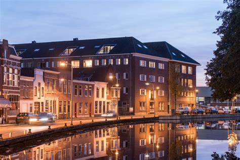 Gallery of Gouda Cheese Warehouse Loft Apartments / Mei architects and ...