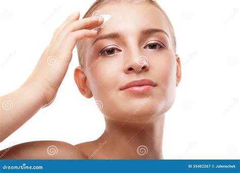 Woman Applying Moisturizer Cream On Face Isolated Stock Image Image