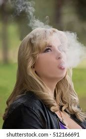 Sexy Blonde Big Breasts Smokes Hookah Stock Photo Edit Now