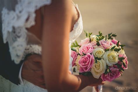 Amazing White And Pink Rose Bouquet In Hands Of Bride As She Wal ...