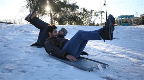 Tallahassee snow brings 'child-like joy' to residents at Cascades Park
