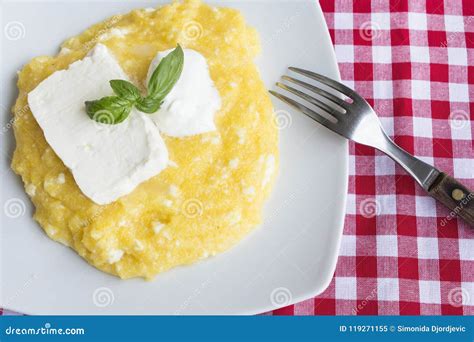 Polenta With Cheese And Sour Cream In A Plate Stock Image Image Of