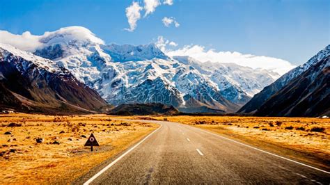 Scenic Winding Road Along Lake Pukaki To Mount Cook National Park