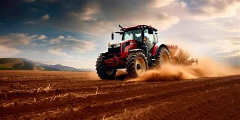 Premium AI Image | powerful tractor plowing a vast open field churning ...