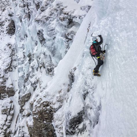 Uk Scotland Glencoe Ben Udlaih Woman Ice Climbing Stock Photo