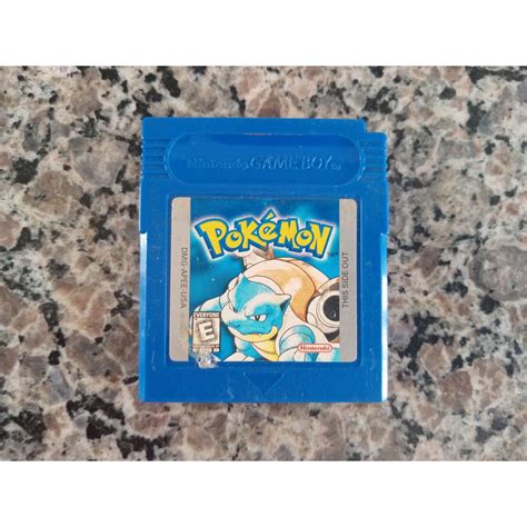 Jogo Pokemon Blue Game Boy original Escorrega o Preço