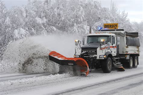 First a record-high temperature, then record-breaking snowfall hit Anchorage on Saturday ...